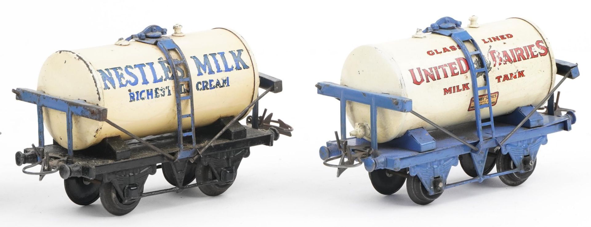 Four Hornby O gauge tinplate model railway advertising wagons comprising Nestle Milk, United Dairies - Image 3 of 5