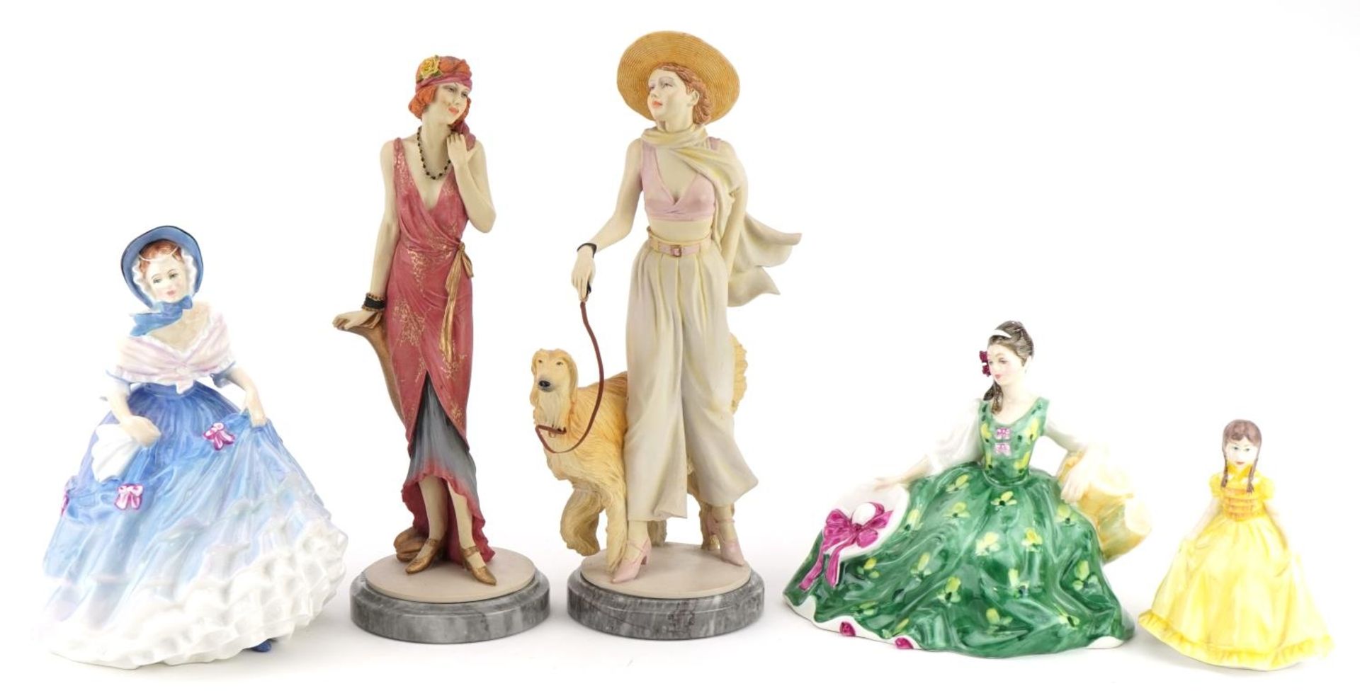 Five Royal Doulton figurines including two Classique examples raised on circular bases
