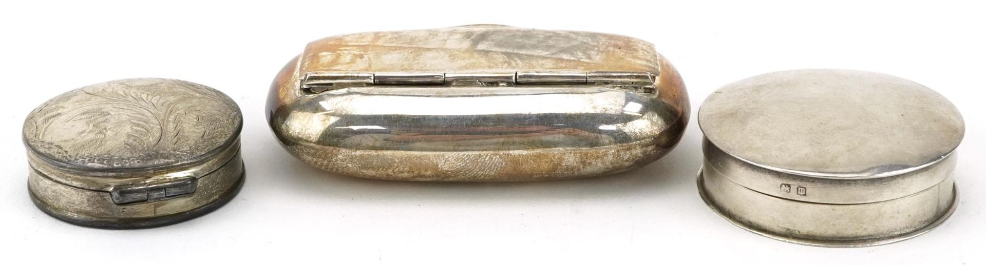 Two circular silver pillboxes and a silver snuff box, the largest 6.5cm wide, total 58.2g - Image 3 of 8
