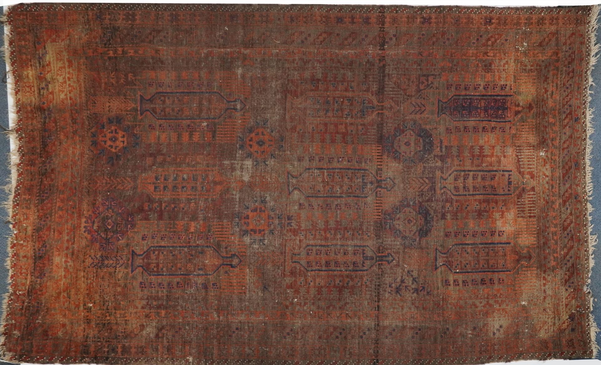 Antique Turkish carpet having an all over blue and red geometric design , 290cm x 206cm