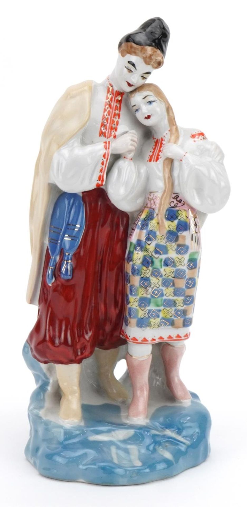 Russian porcelain figure group of two lovers, inscribed to the base, 28cm high