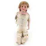 Armand Marseille, large antique German bisque headed and leather doll with open close eyes and