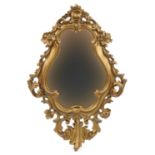 Ornate gilt framed acanthus design cartouche shaped wall mirror, 48cm x 33cm