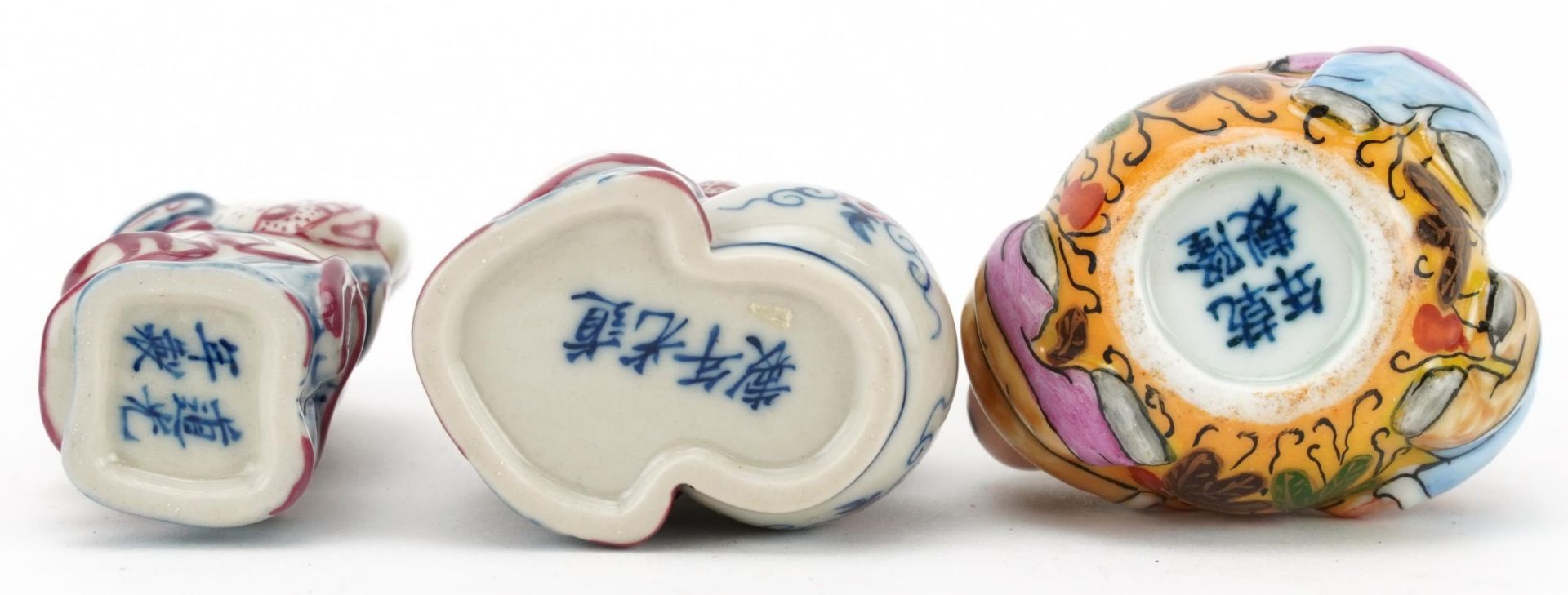 Three Chinese porcelain figural snuff bottles including one hand painted with leaves, the largest - Image 3 of 3