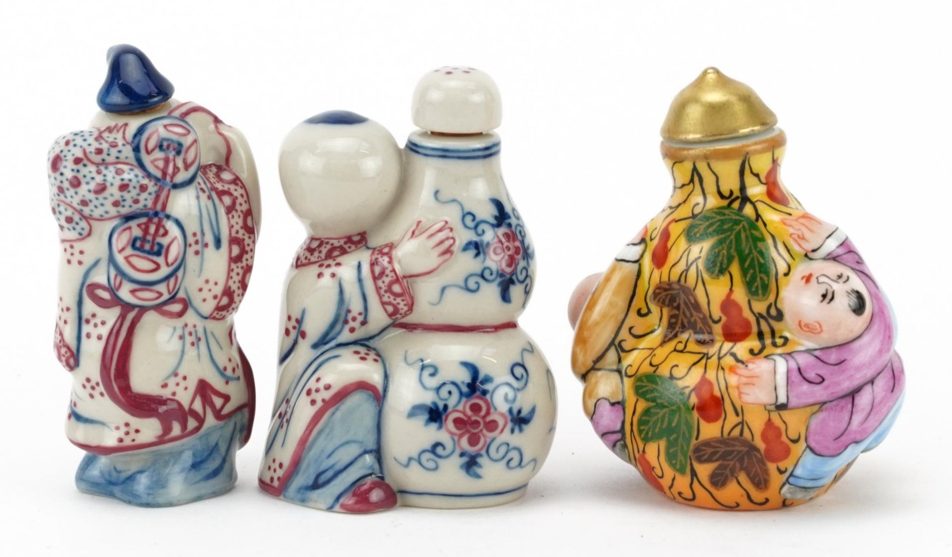 Three Chinese porcelain figural snuff bottles including one hand painted with leaves, the largest - Image 2 of 3