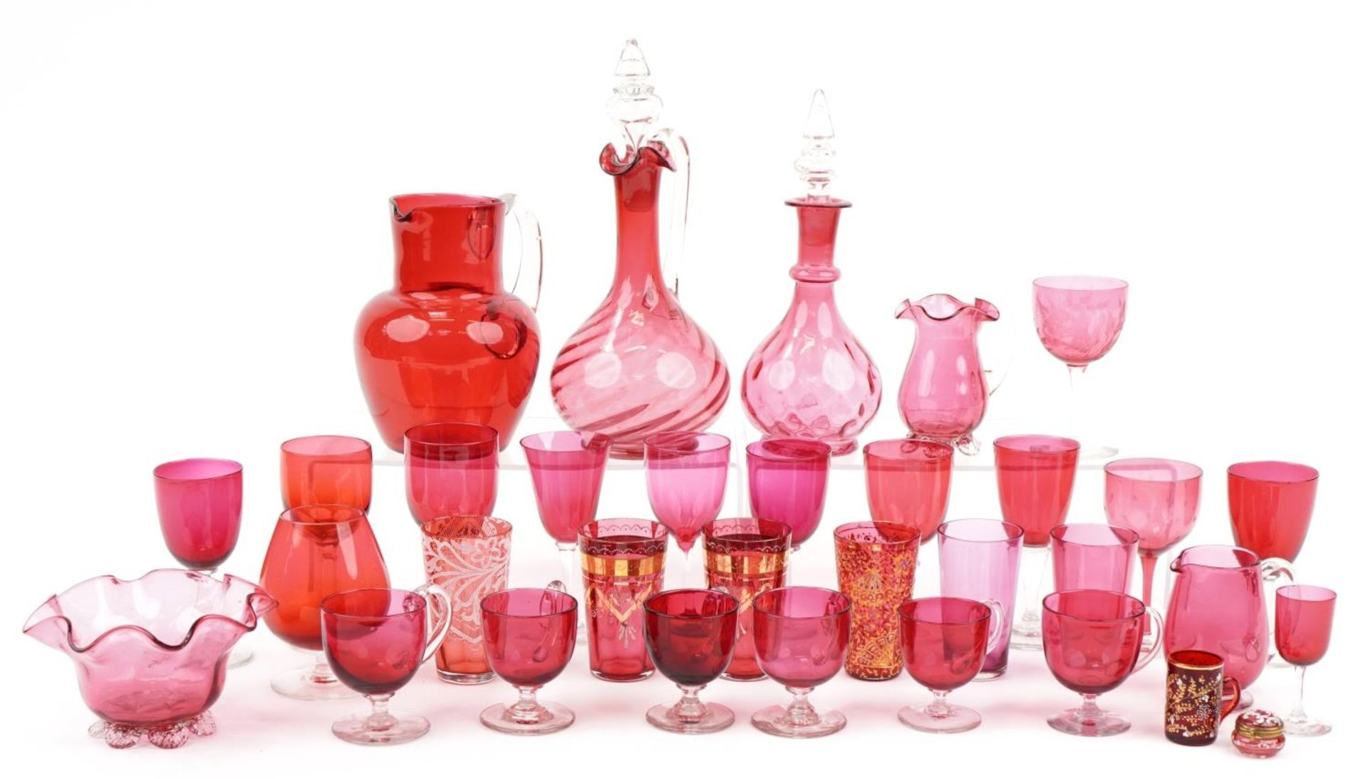 Victorian cranberry glassware including claret jug, various glasses, enamel trinket box and