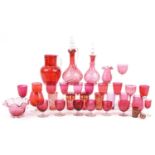 Victorian cranberry glassware including claret jug, various glasses, enamel trinket box and