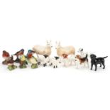 Twelve Beswick animals comprising six birds, four dogs and two sheep together with two Border Fine