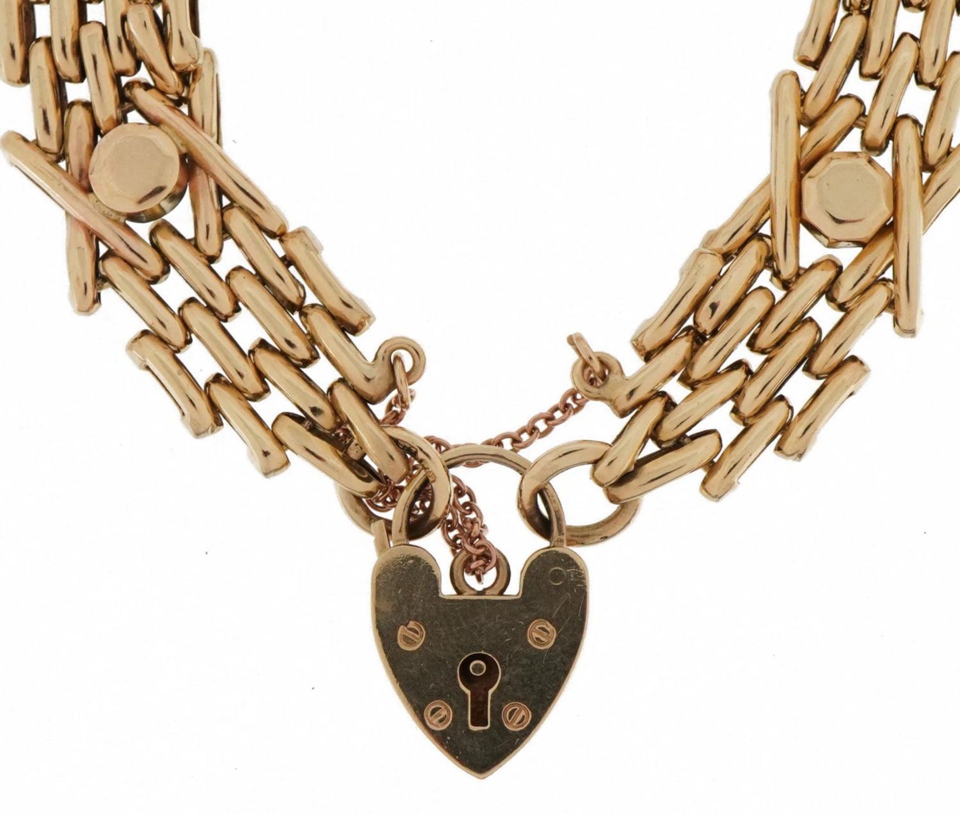 9ct gold four row gate link bracelet with love heart padlock and safety chain, 18.9g