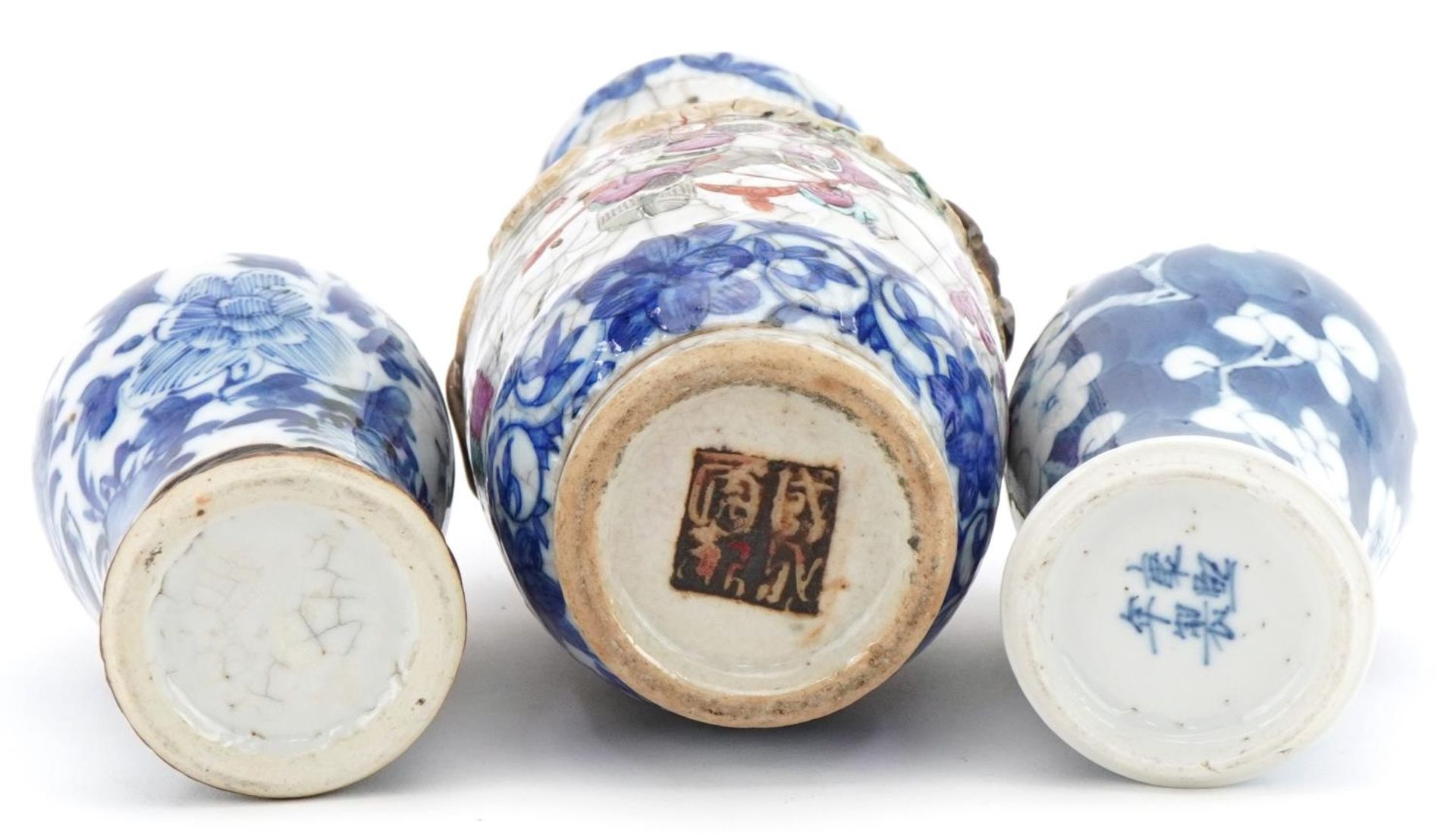 Three Chinese porcelain vases including two baluster examples, one hand painted with prunus flowers, - Image 11 of 12