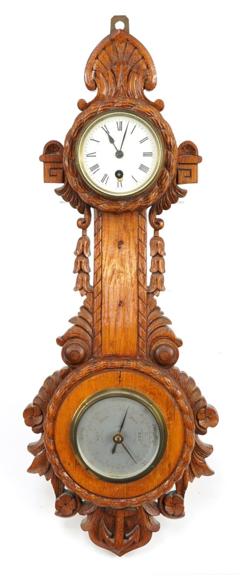Naval interest carved oak wall barometer with clock having enamelled dial and Roman numerals, carved