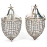 Pair of ornate silvered metal acorn chandeliers with swags and bows, 58cm high