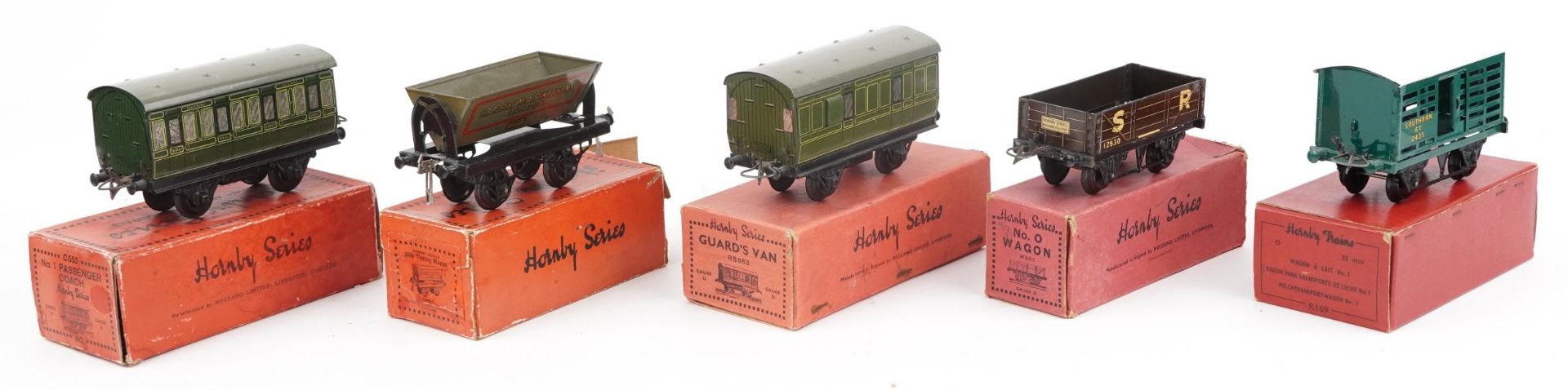 Five Hornby O gauge tinplate model railway wagons with boxes comprising passenger coach guards - Image 4 of 5