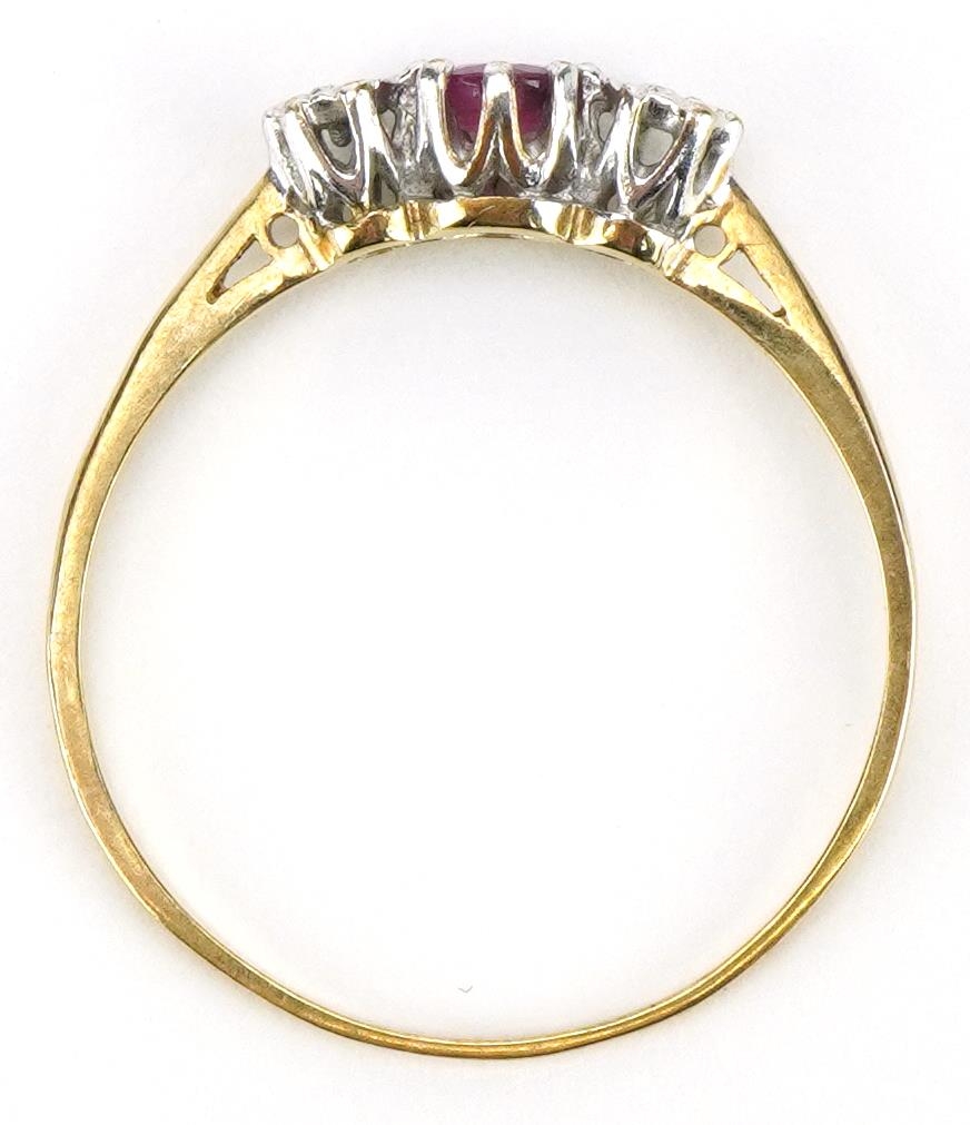 9ct gold ruby and diamond three stone ring, the ruby approximately 3.2mm in diameter, size Q/R, 1.1g - Image 3 of 4
