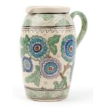 Manner of Charlotte Rhead, large Highwoods pottery jug hand painted with flowers, 30cm high