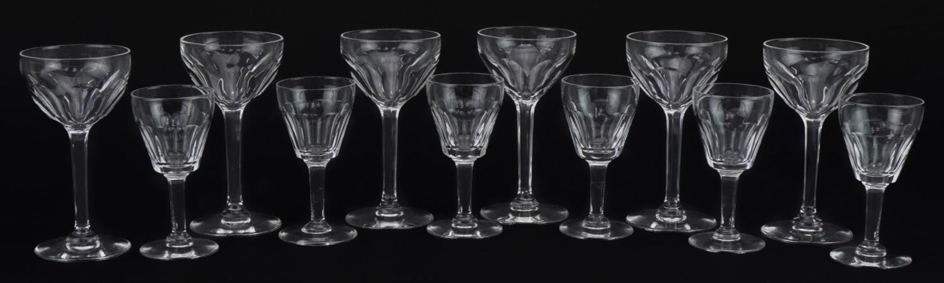 Two sets of six good quality cut glass glasses, the largest each 11cm high