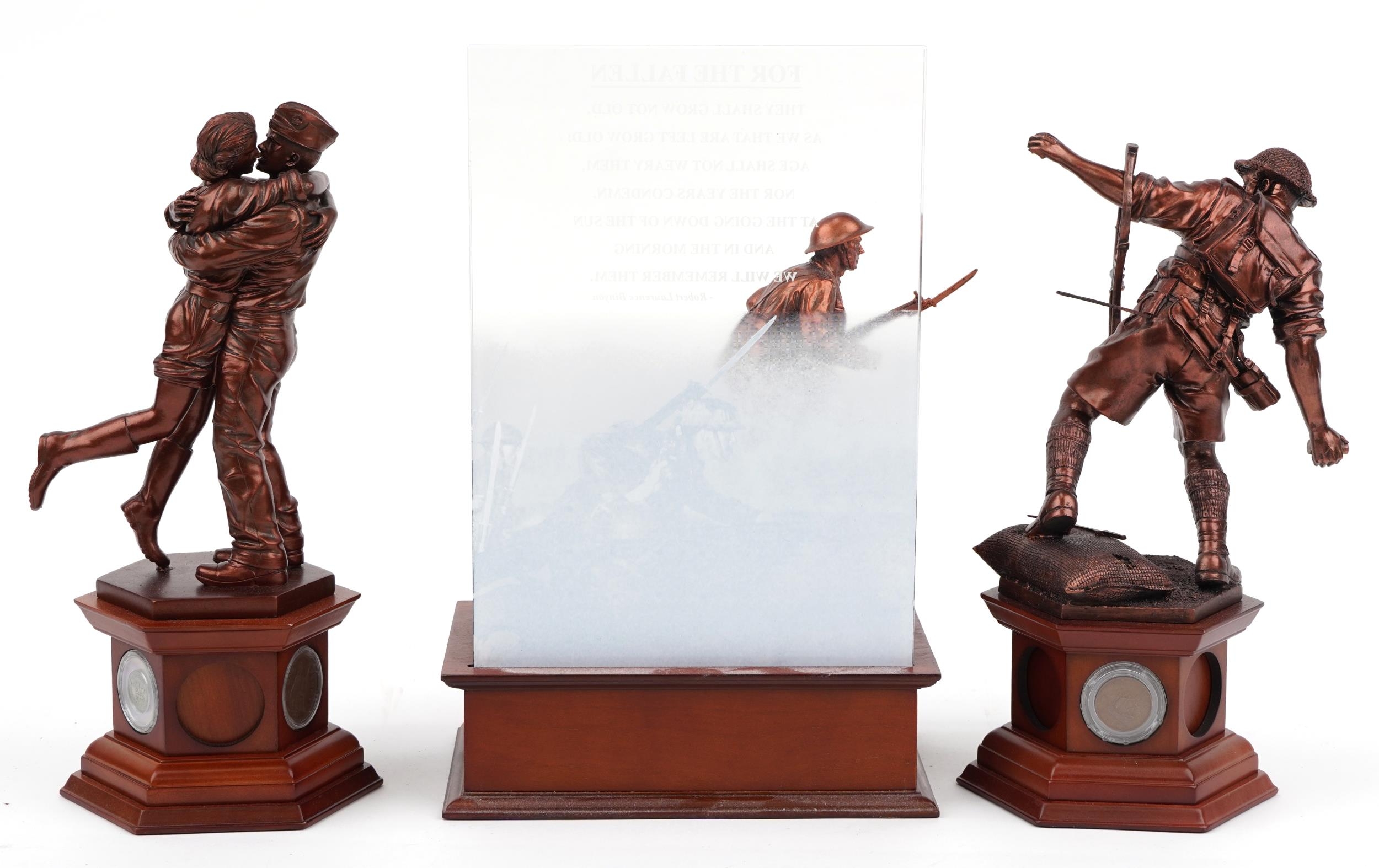 Three bronzed commemorative military figures raised on wooden bases set with coins and medallions by - Image 2 of 3