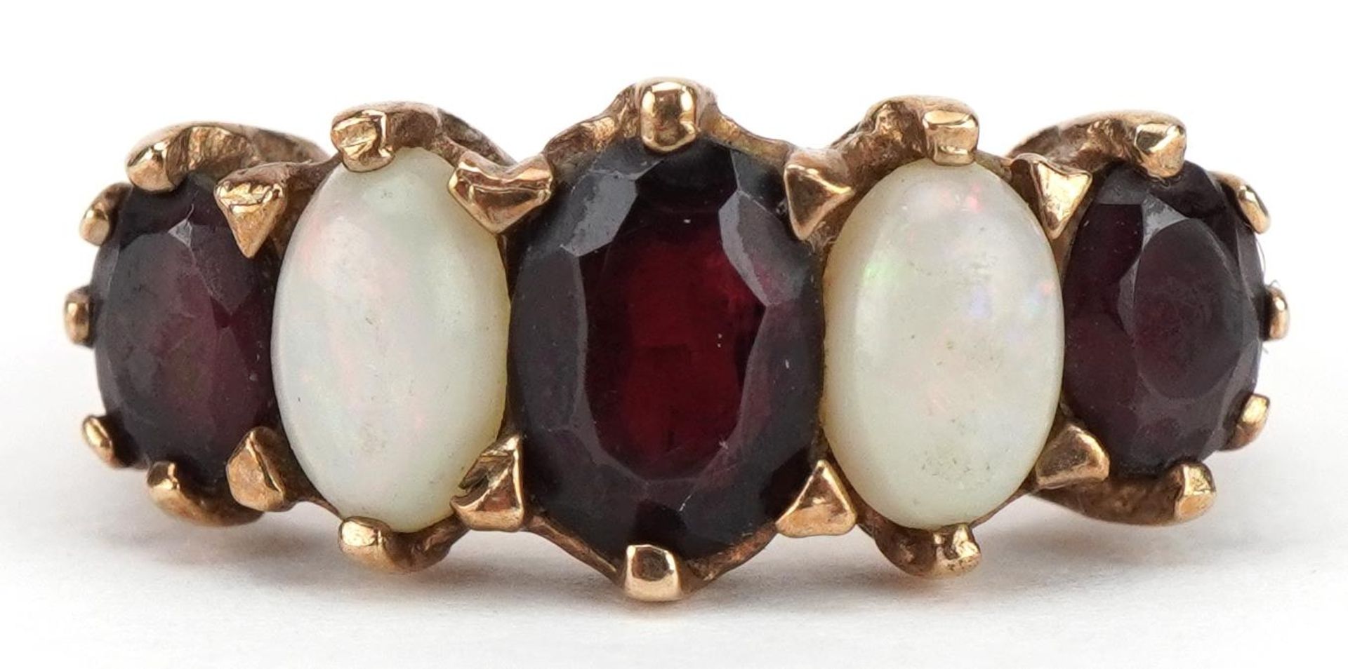 Victorian style 9ct gold garnet and cabochon opal five stone ring with ornate setting, size J, 3.9g