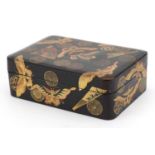 Japanese lacquered box and cover gilded with butterflies amongst fans and stylised roundels, 5cm x