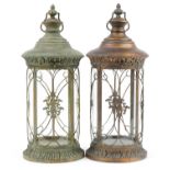 Two partially gilt lantern design candleholders, 57cm high