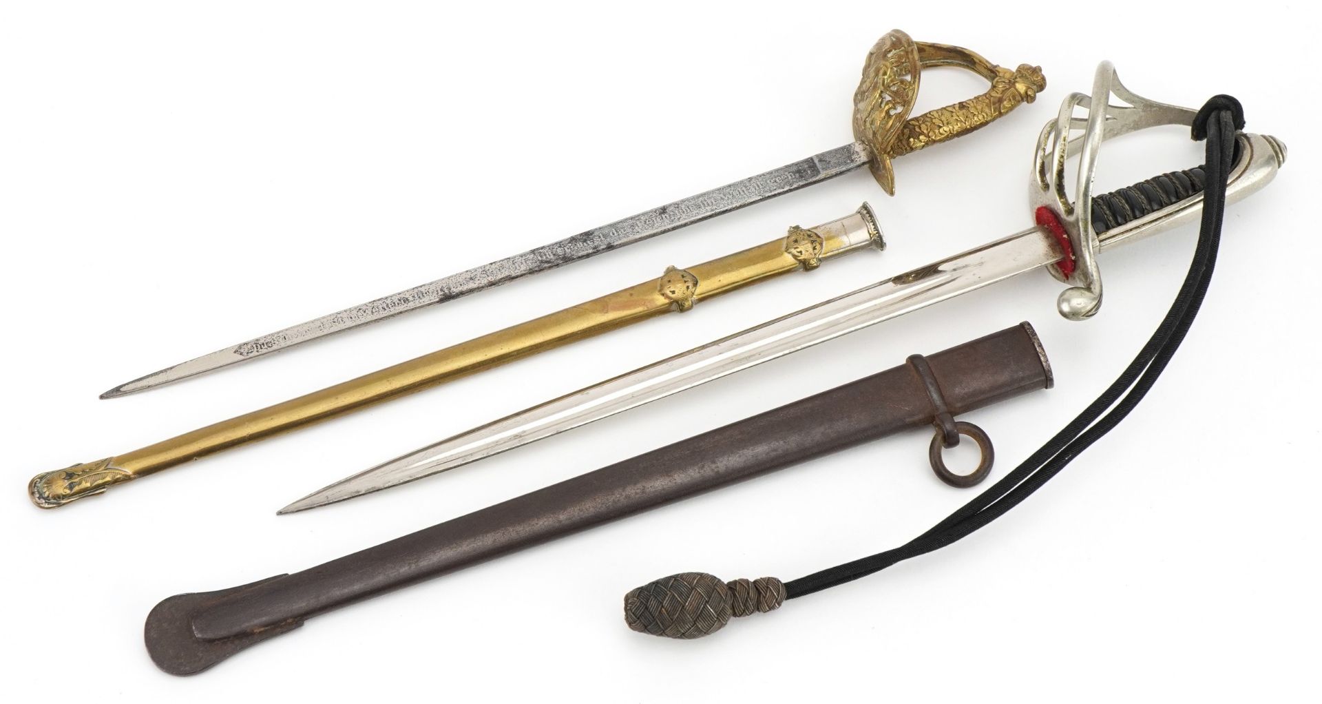 Two military interest letter openers in the form of miniature swords with scabbards including a