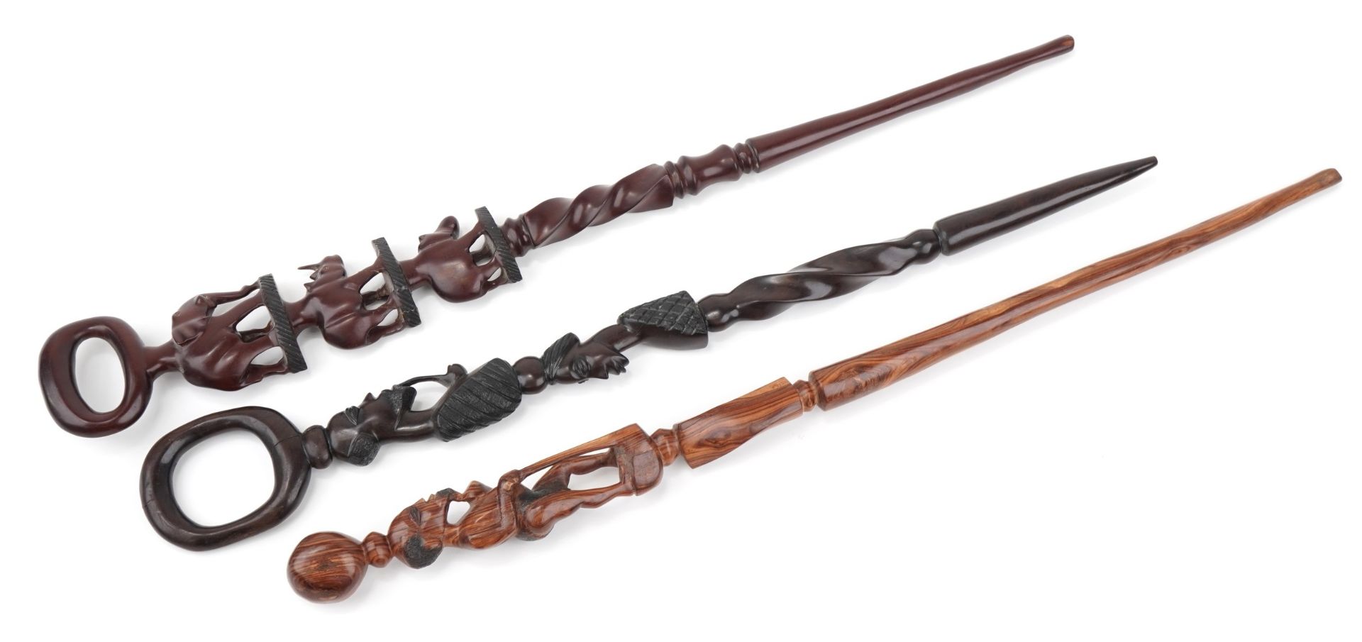 Three African hardwood walking sticks including two carved with figures, the largest 104cm in length - Image 3 of 3