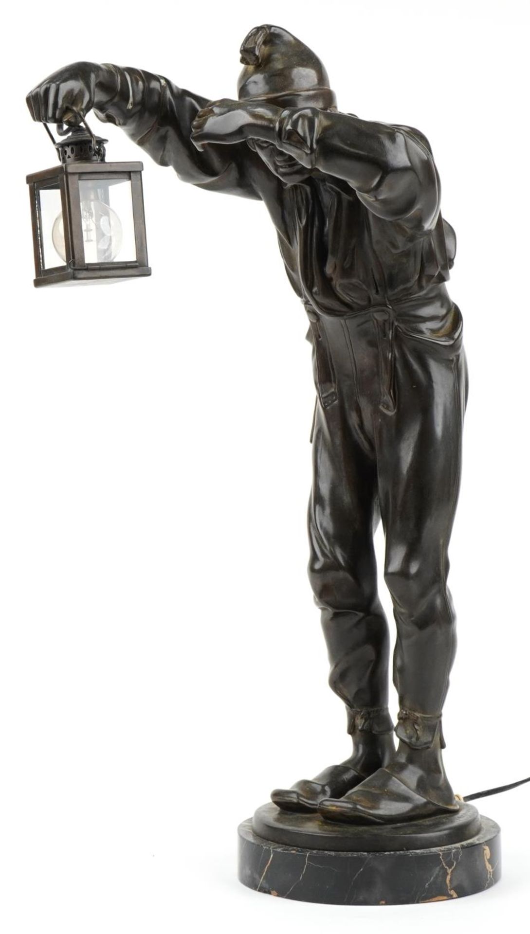 Franz Bernauer, early 20th century patinated bronze lamp in the form of a night watchman holding a