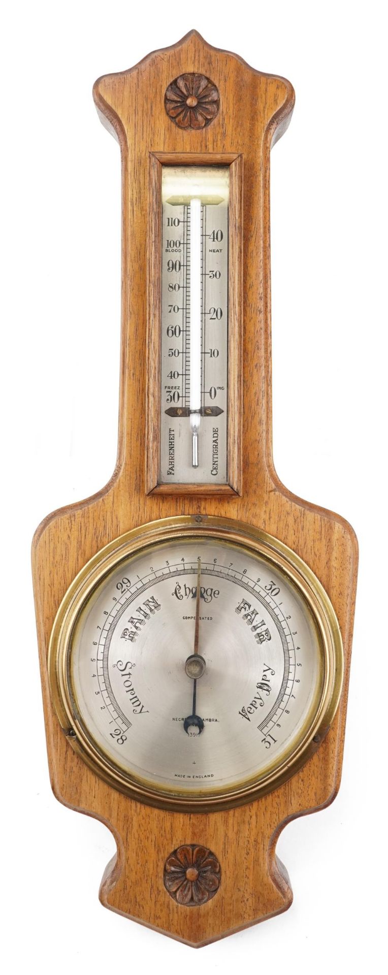 Negretti & Zambra of London, oak wall barometer with thermometer having silvered dials, numbered
