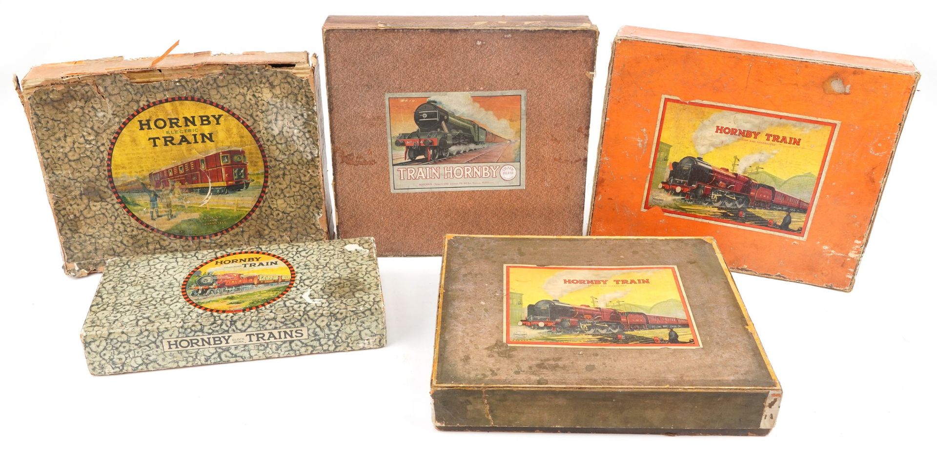 Five vintage Hornby O gauge model railway boxes including No 3C Royal Scot Passenger set and E320