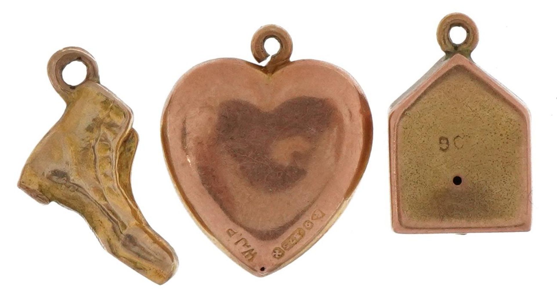 Three 9ct gold charms comprising love heart, boot and clock, the largest 1.6cm high, total 3.0g - Image 2 of 3