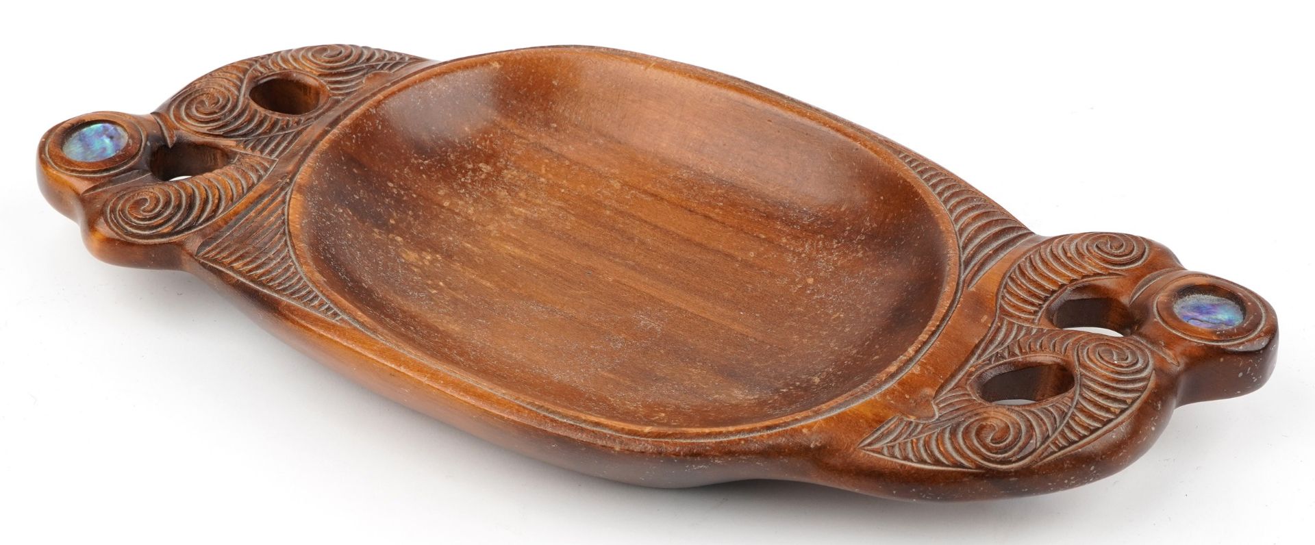 New Zealand Maori carved wood twin handled bowl with inset abalone panels, 42cm wide - Image 2 of 8