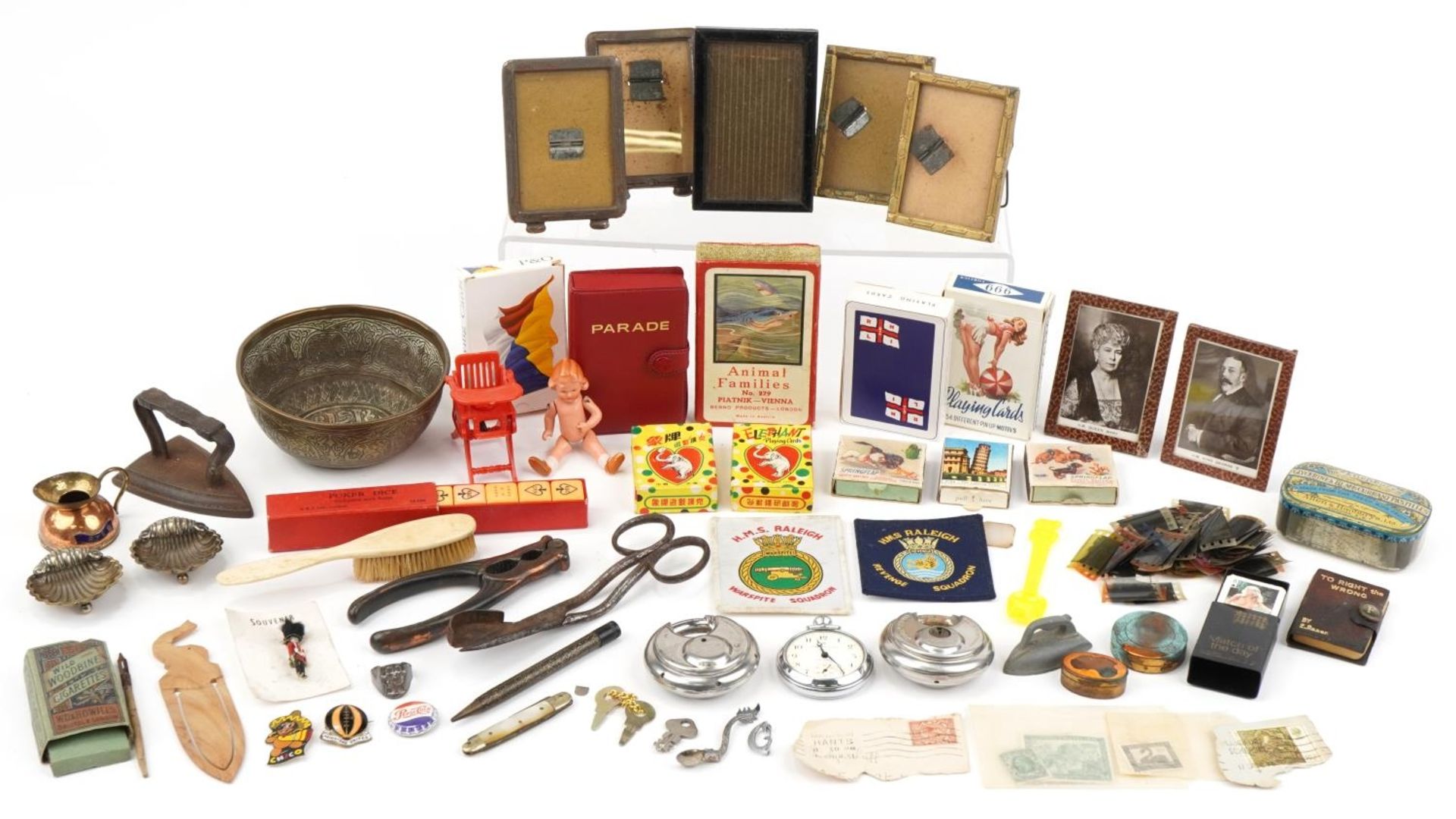 Sundry items including photo frames, playing cards, miniature German porcelain doll, padlocks and an