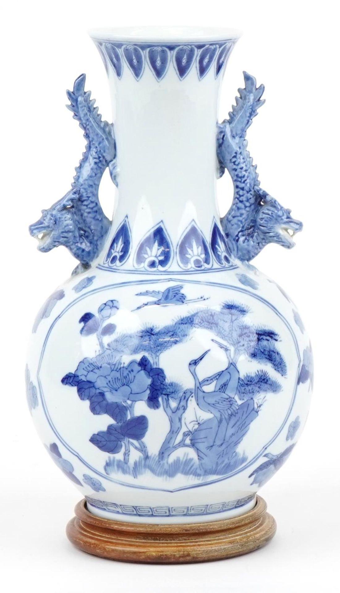 Chinese blue and white porcelain vase with dragon handles raised on a hardwood stand, decorated with - Image 3 of 6