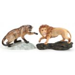 Two large Beswick animals comprising Mountain Lion number 1702 and lion with matt glaze, each 32cm
