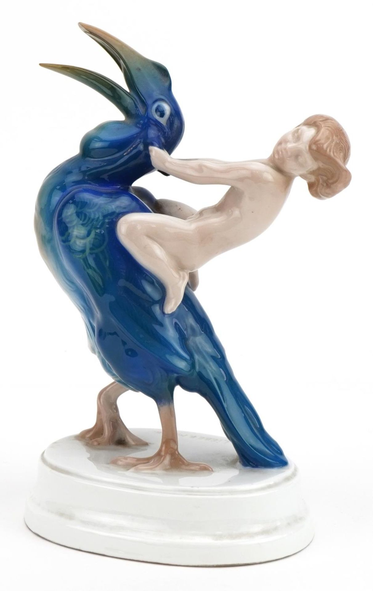 Ferdinand Liebermann for Rosenthal, German porcelain figure group of a nude boy seated on a bird,