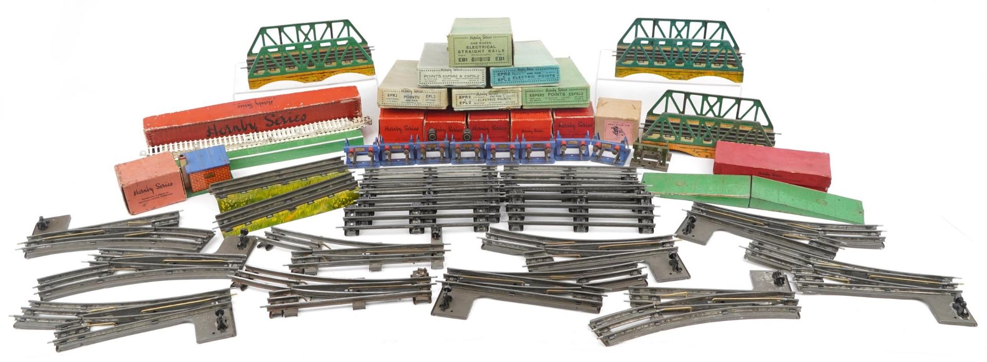 Collection of Hornby O gauge tinplate model railway track, connecting plates, rails and bridges,