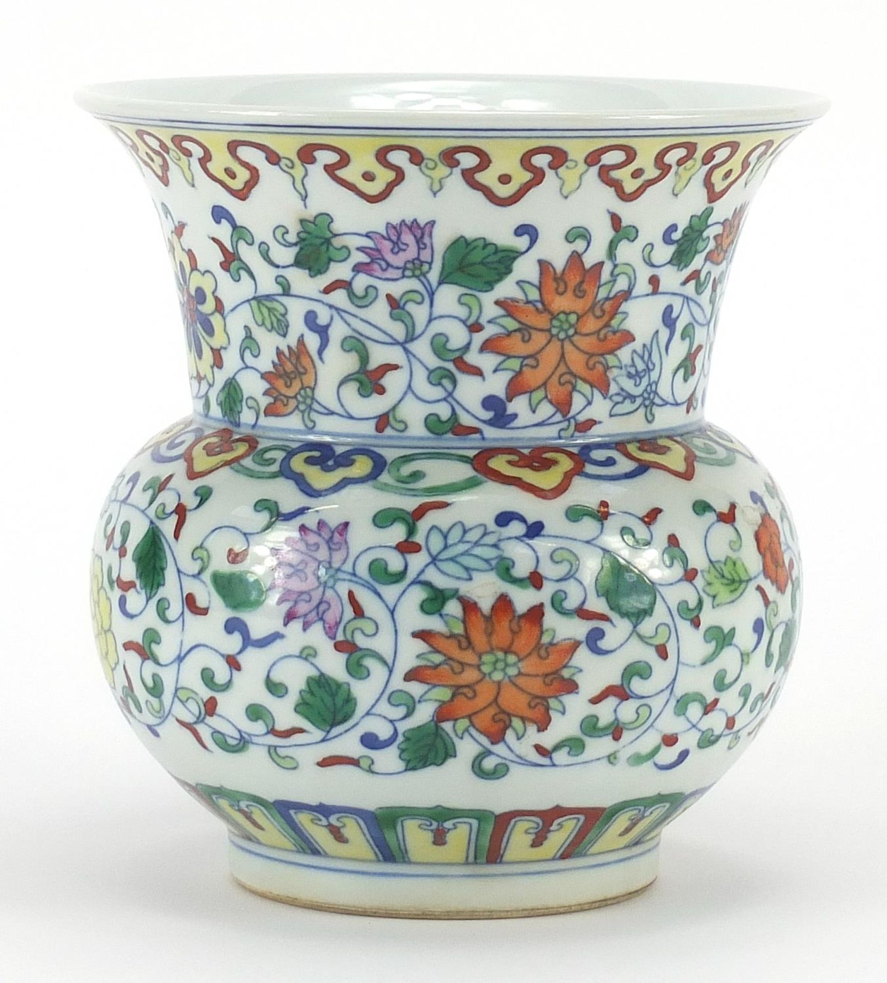 Chinese doucai porcelain vase decorated with flowers, six figure character marks to the base, 15cm