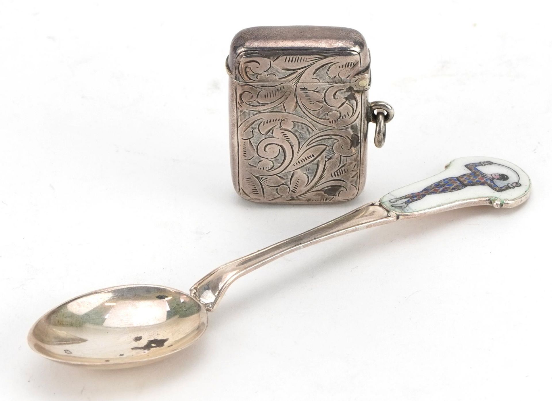 Silver golfing interest spoon enamelled with a Pierrot engraved Hole in One, Fishguard G C .S Davies