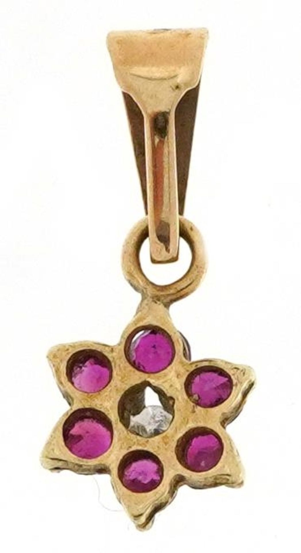 Unmarked gold diamond and ruby flower head pendant, 1.4cm high, 0.3g - Image 2 of 2