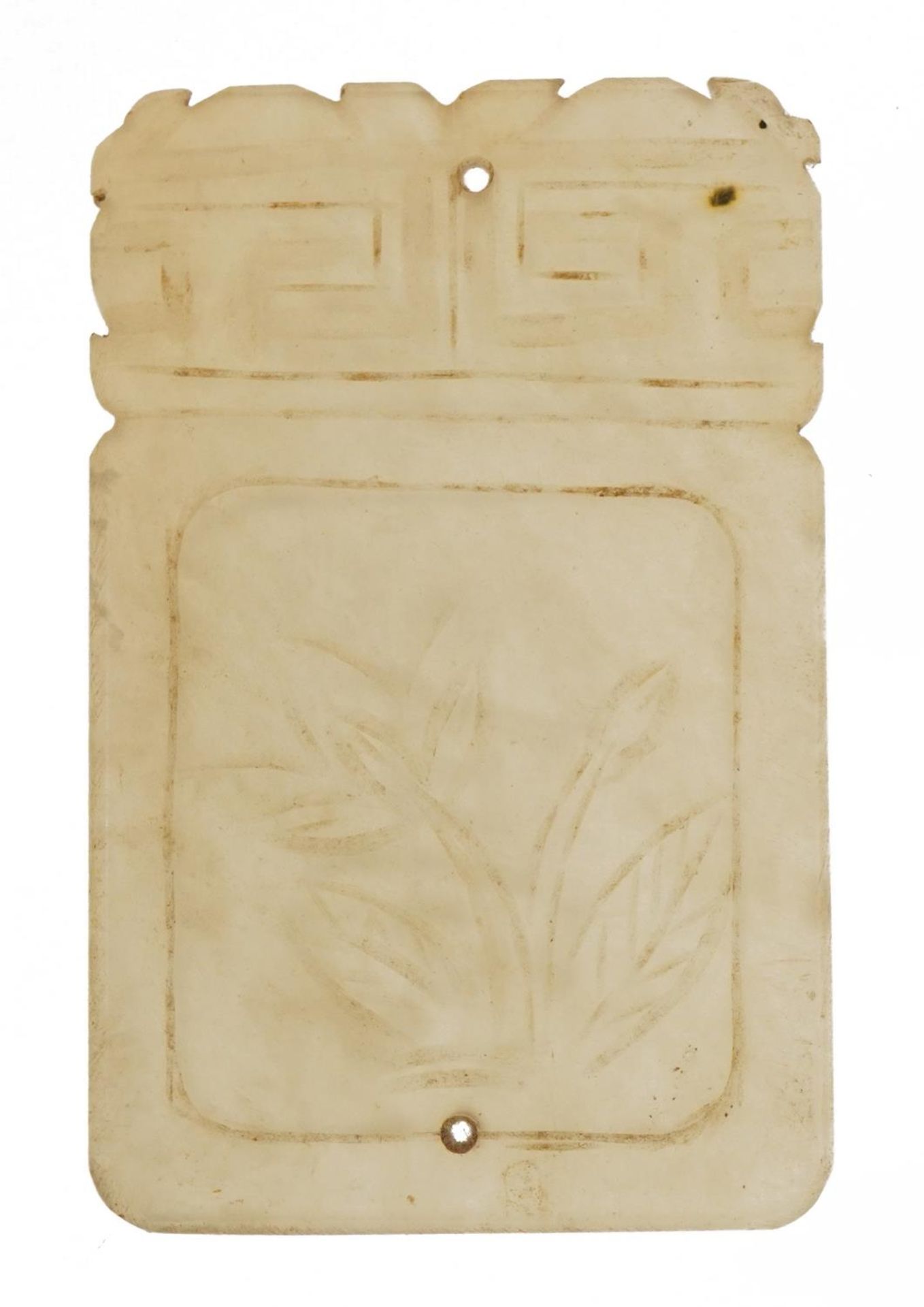 Chinese pale green jade tablet carved with flowers, 7cm x 4.5cm