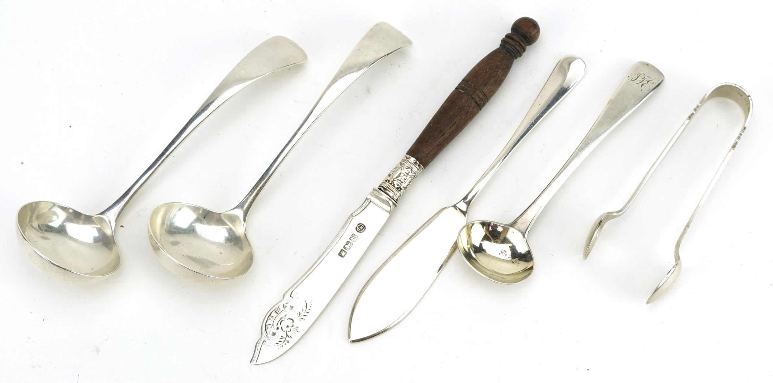 Silver flatware including a pair of ladles and sugar tongs, various hallmarks, the largest 13cm in
