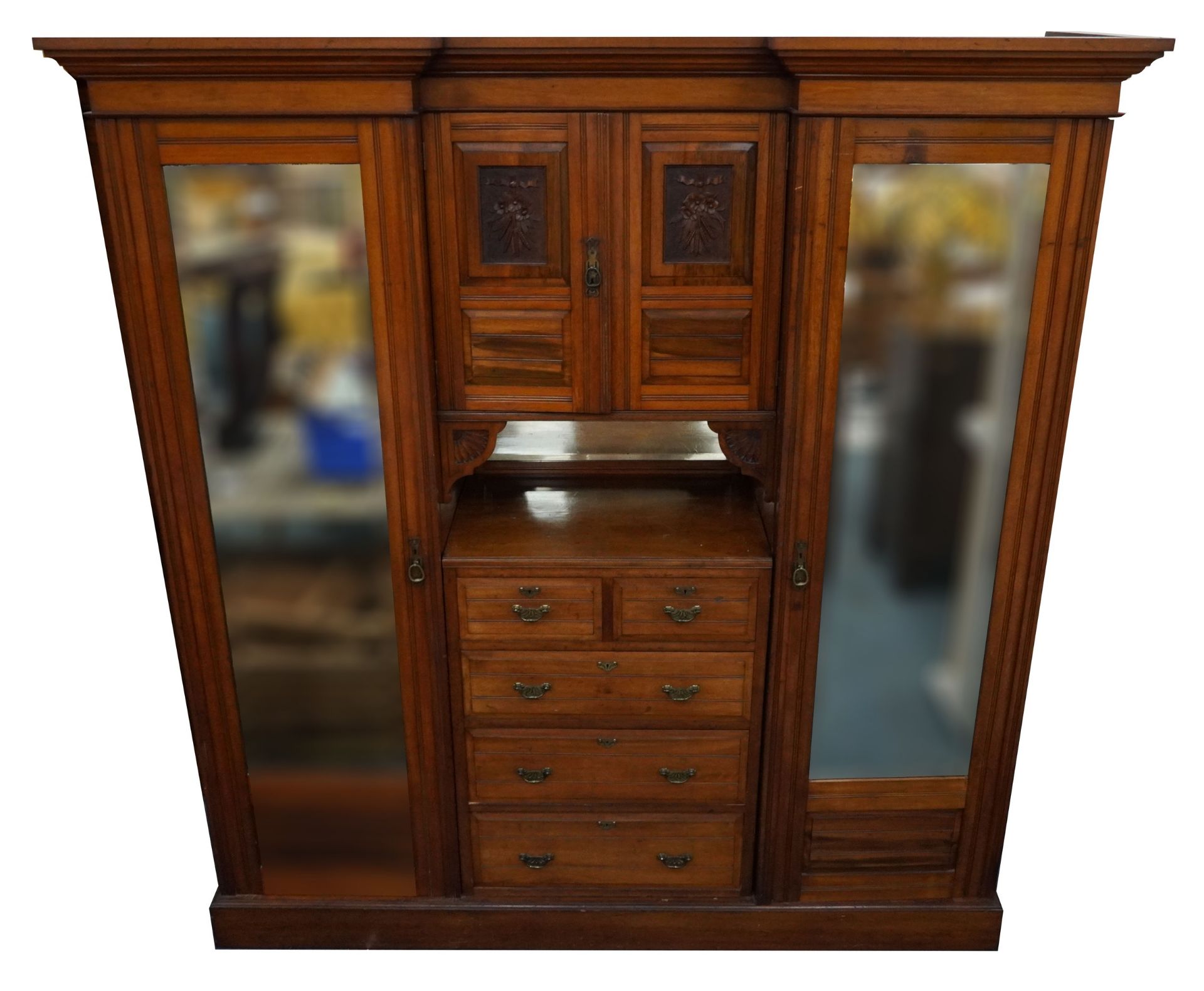 Edwardian satinwood compactum wardrobe with two bevelled glass mirrored doors, two central