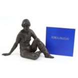 Enid L Bloom, cold cast bronze sculpture of a seated female titled Dance Class and related