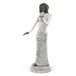 Pottery figurine of a jazz singer having a raku glaze, 41cm high