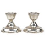 Pair of circular silver dwarf candlesticks, Birmingham 1987, 7cm high, 307.0g