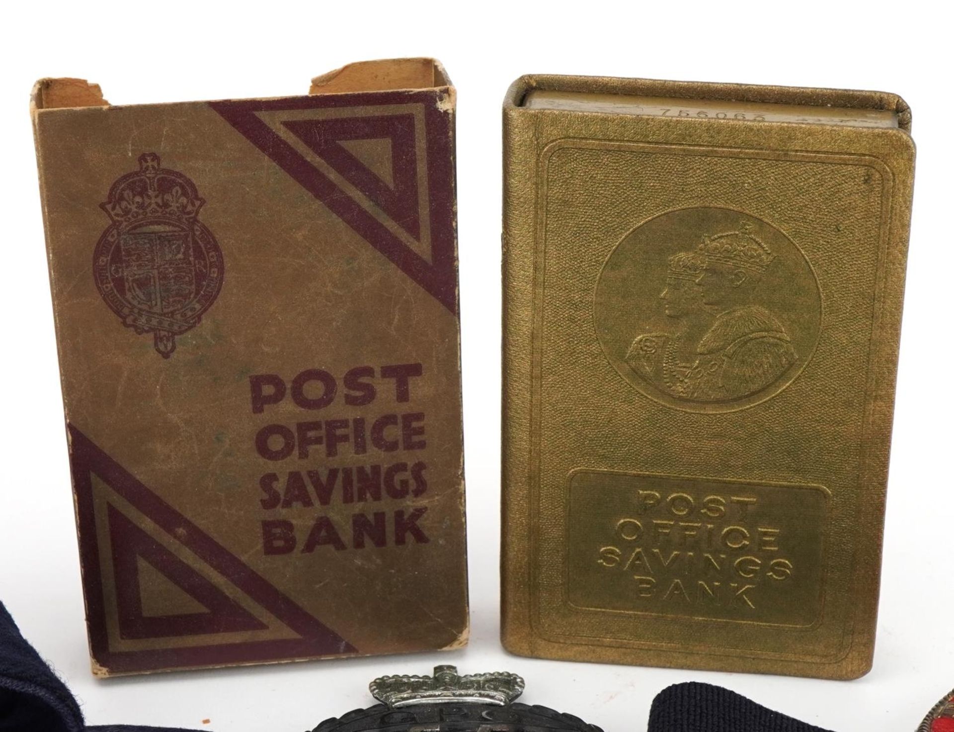 Post Office collectables including early postman armband, badges and Savings Bank - Image 2 of 5