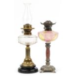 Victorian oil lamp with reeded brass column and an Art Nouveau style example