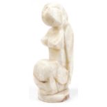Large Modernist carved onyx sculpture in the form of a stylised nude female, engraved initials E G