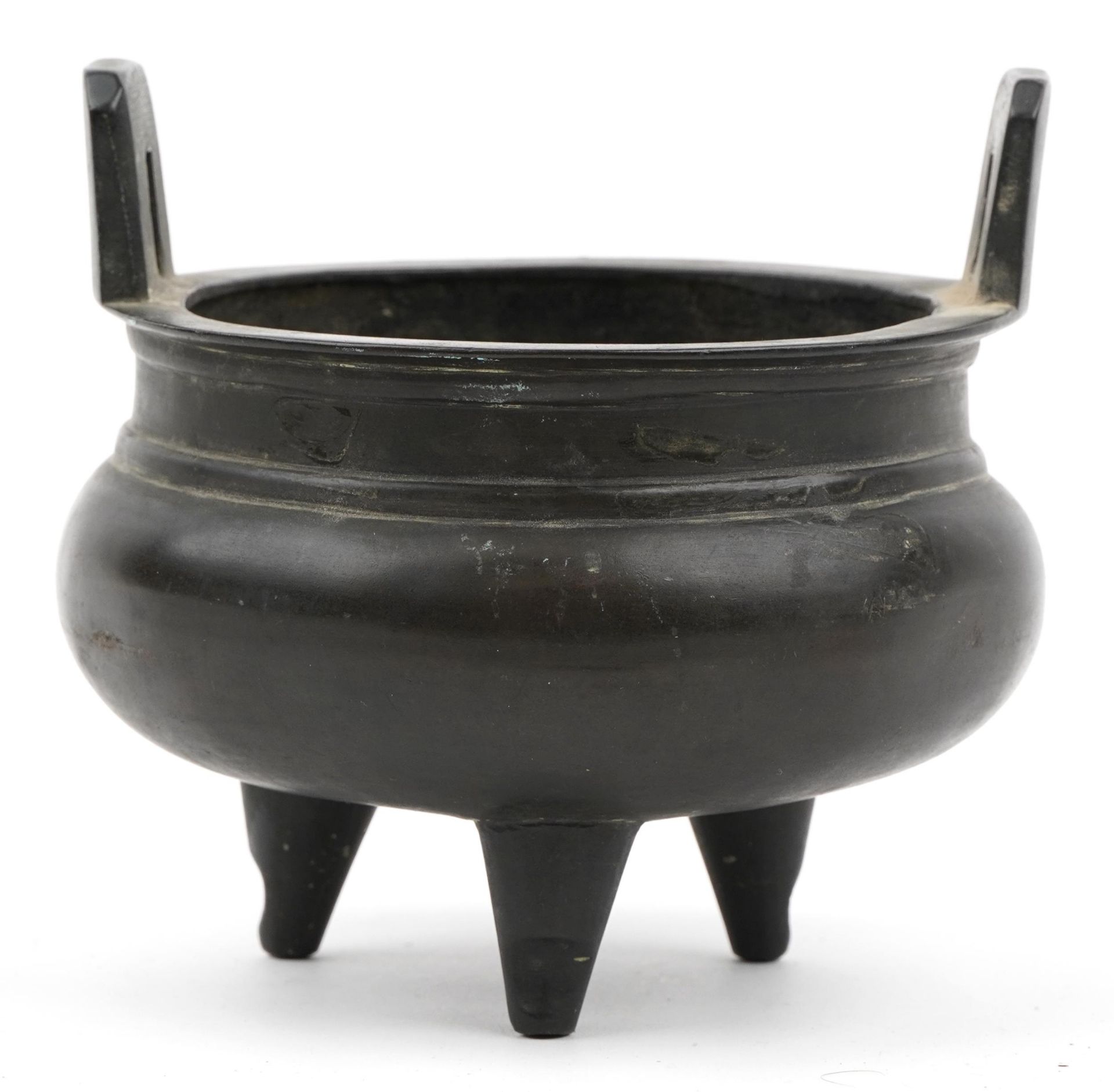 Chinese patinated bronze tripod censer with twin handles, six figure character marks to the base, - Image 2 of 14