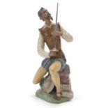 Lladro gres figure of Don Quixote with sword, 23cm high